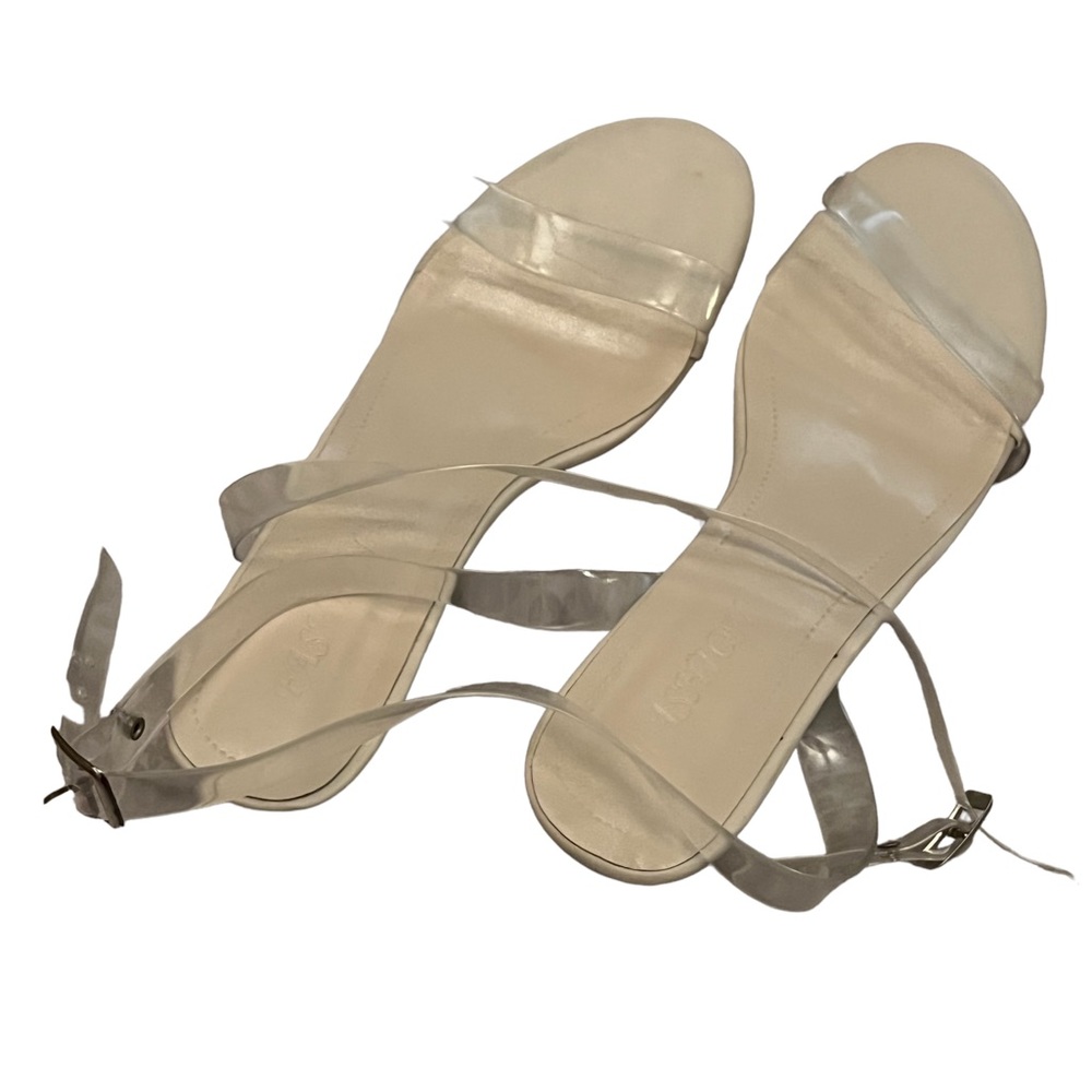 FASHION brand heels. Both the straps and heels are clear. Gently worn.
